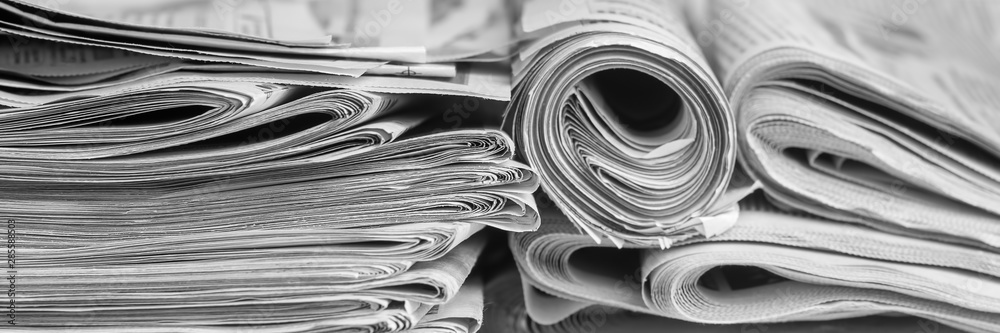 Rolled Up Newspapers